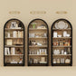 Tall Black Arched Bookcase Featuring Spacious Shelving