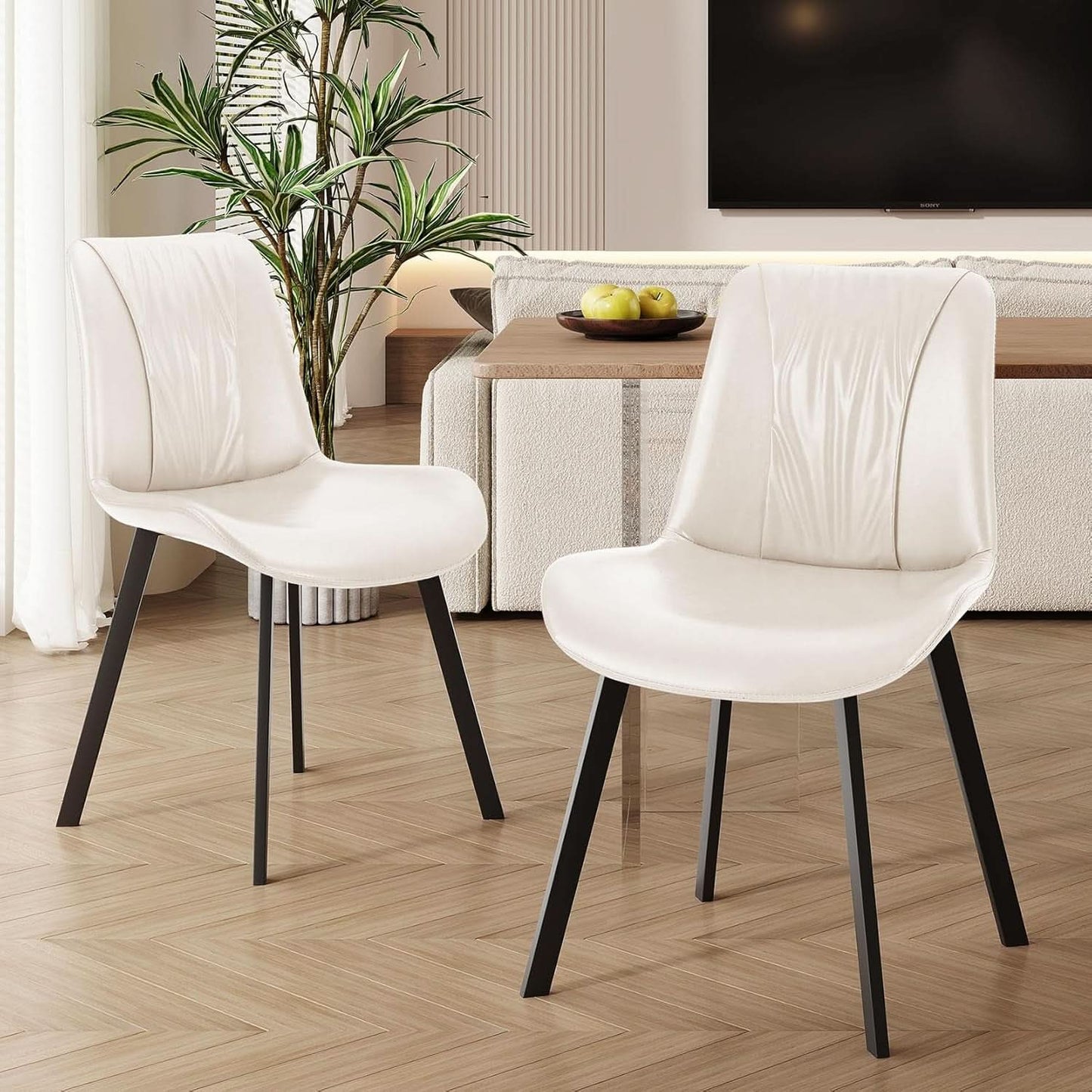 White Upholstered Faux Leather Dining Chairs Fourpack
