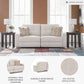 Beige Manual Reclining Sofa Featuring Plush Tufting