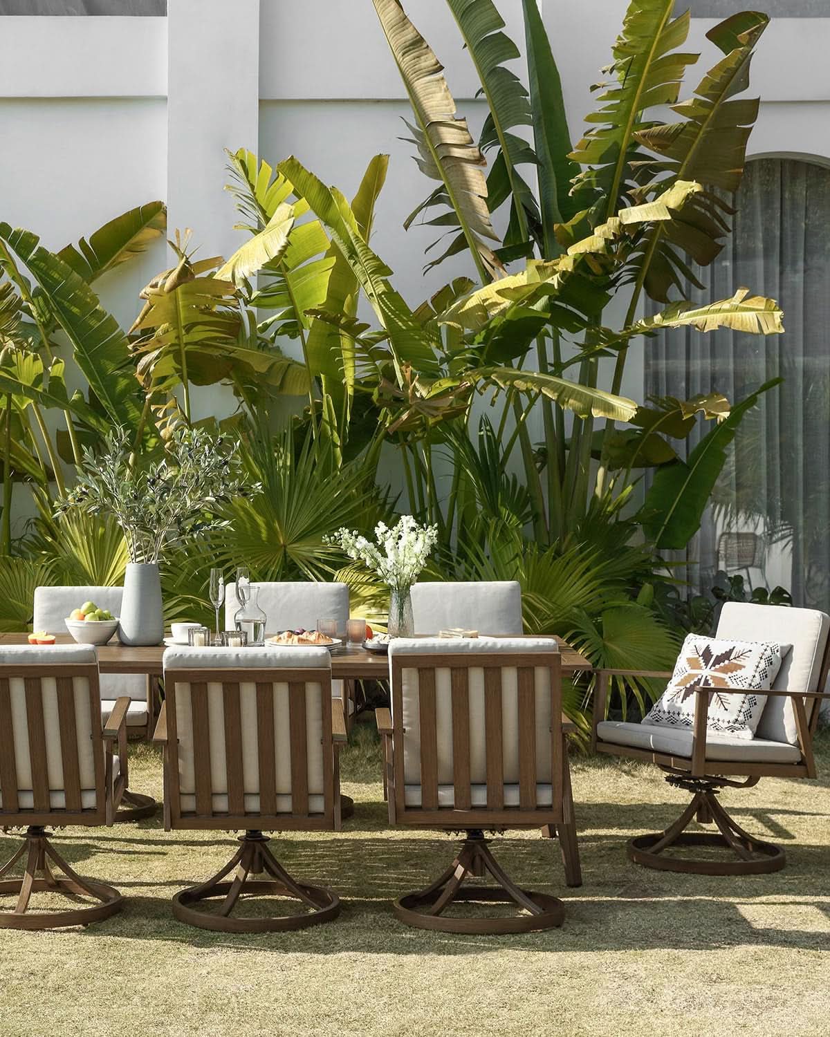 Nine Piece Outdoor Patio Dining Set with Swivel Chairs