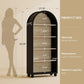 Tall Black Arched Bookcase Featuring Spacious Shelving