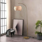 Brass Wave Arc Floor Lamp Handwoven Wicker Shade Aura