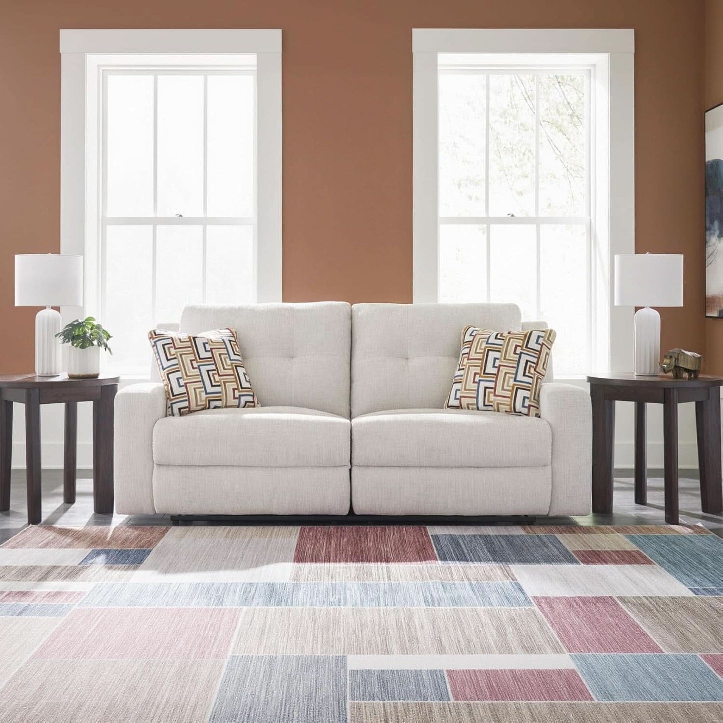 Beige Manual Reclining Sofa Featuring Plush Tufting